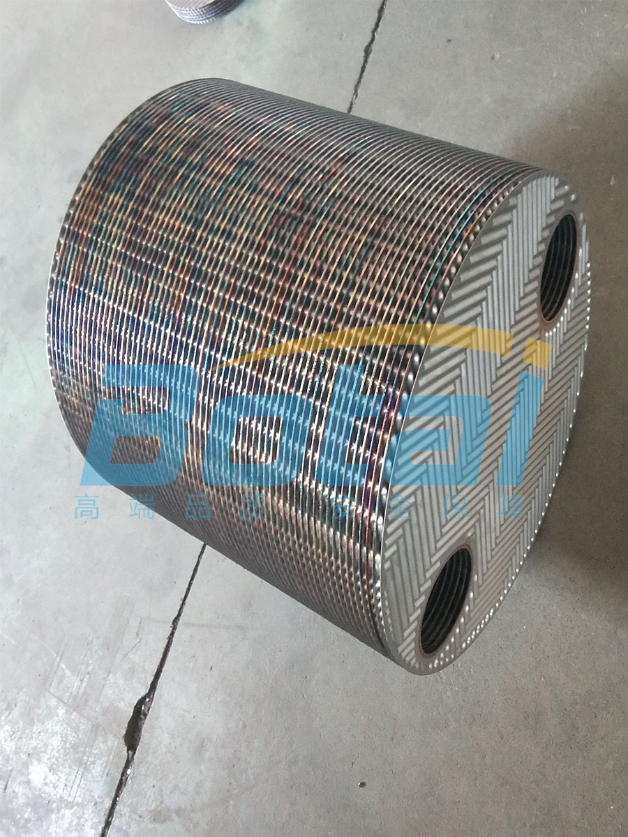 Fully welded plate and shell heat exchanger