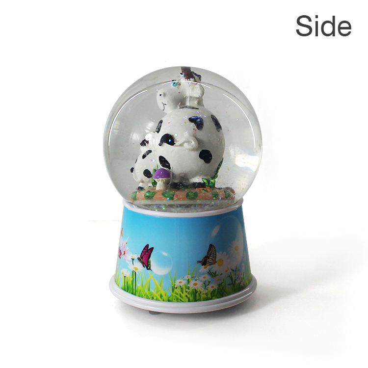Resin crafts Custom music rotate plastic cow snow globe