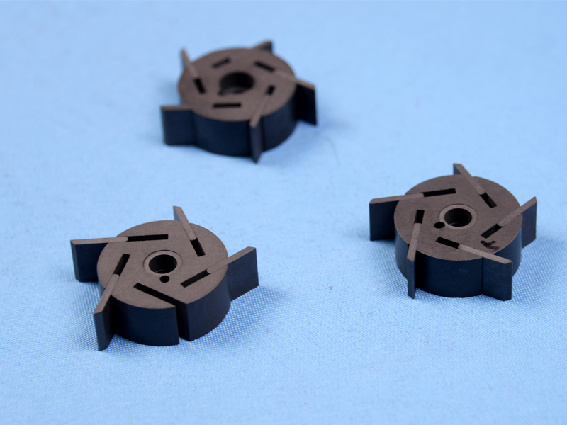 Carbon rotors and blades for electronic vacuum pumps