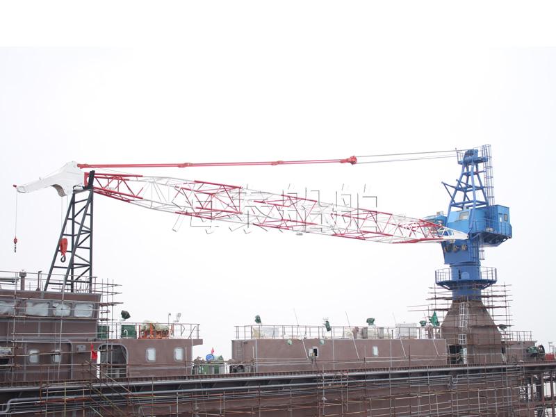 Floating dock with electric truss arm crane