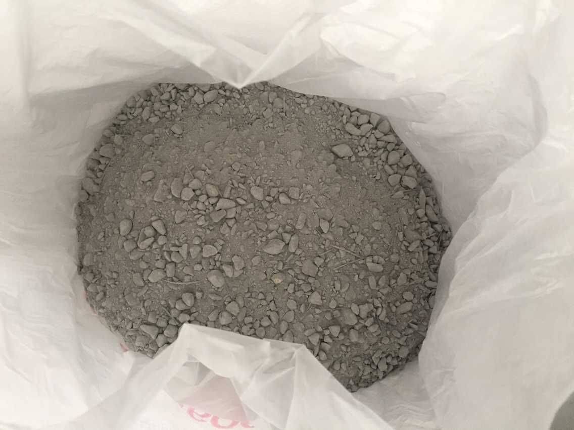 Low cement anti-aluminum liquid infiltration castable