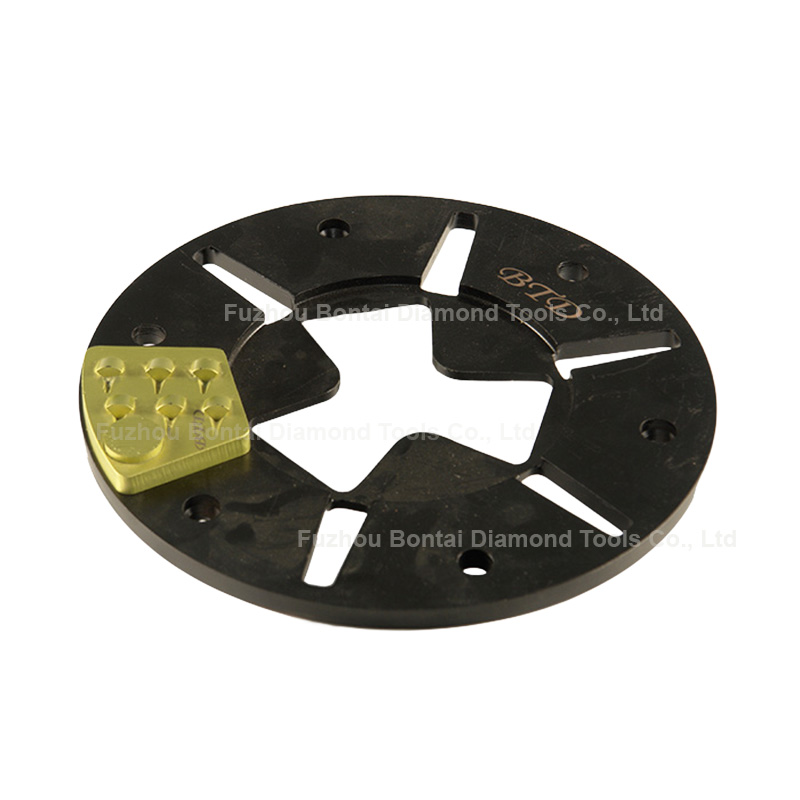 Quick change adaptor plate for HTC grinder to hold redi lock grinding pads
