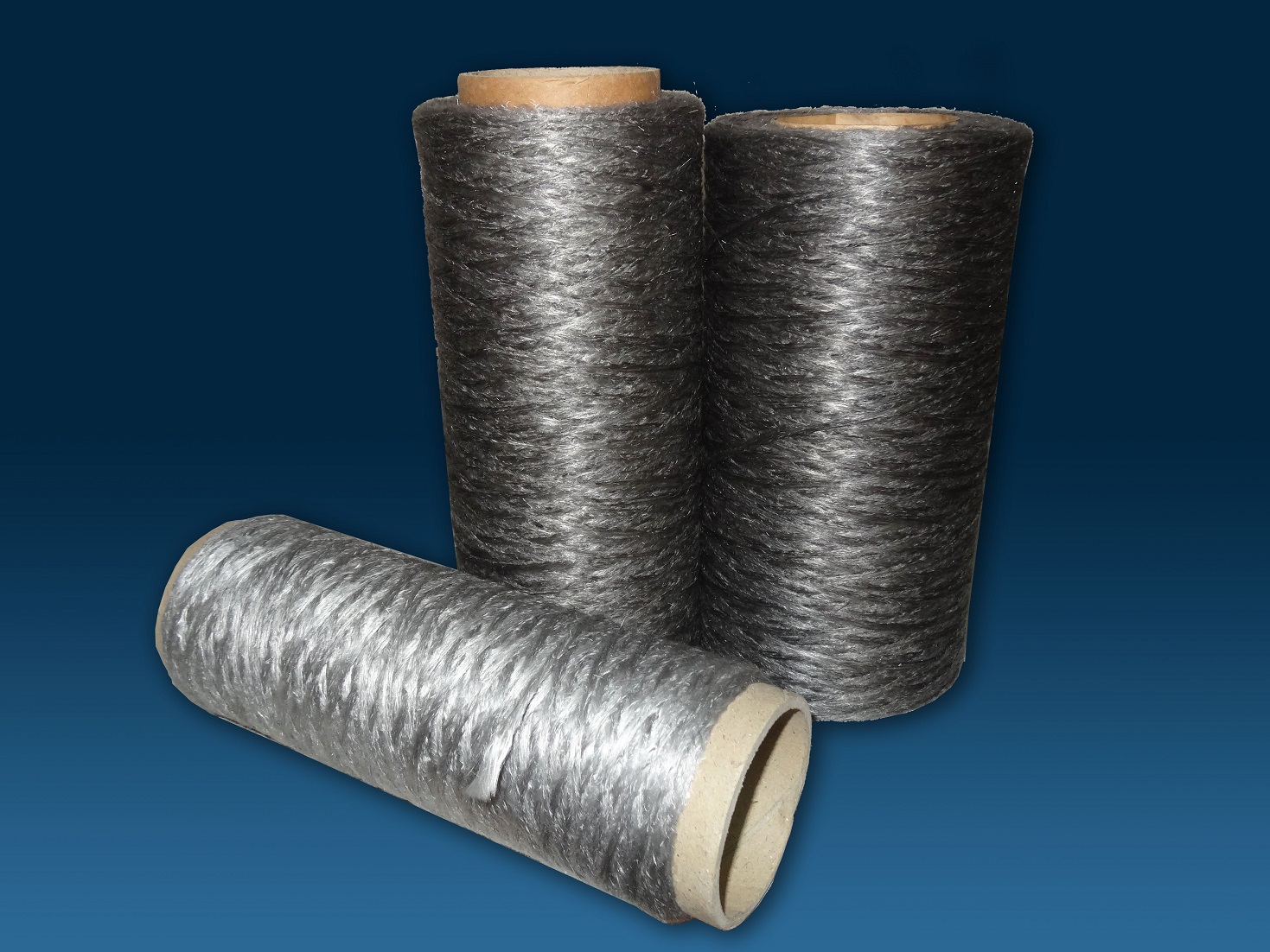 Graphite coated glass fiber texturized yarn