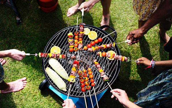 Which drinking utensils do I need to prepare for manually rotating the grill outdoors?